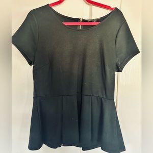 Forever 21+. Black Short sleeve top . Pedulum waist and zip back. Size 1X